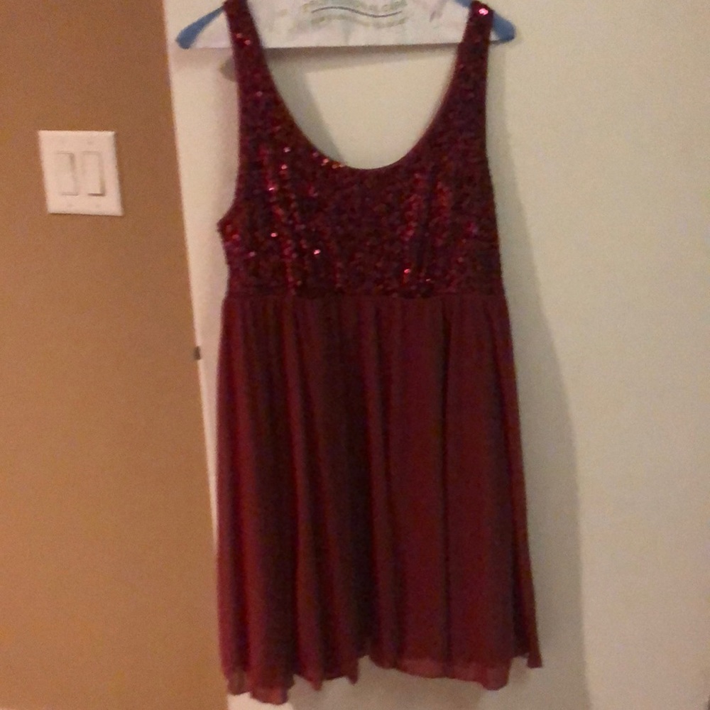 Red dress. Sequined top